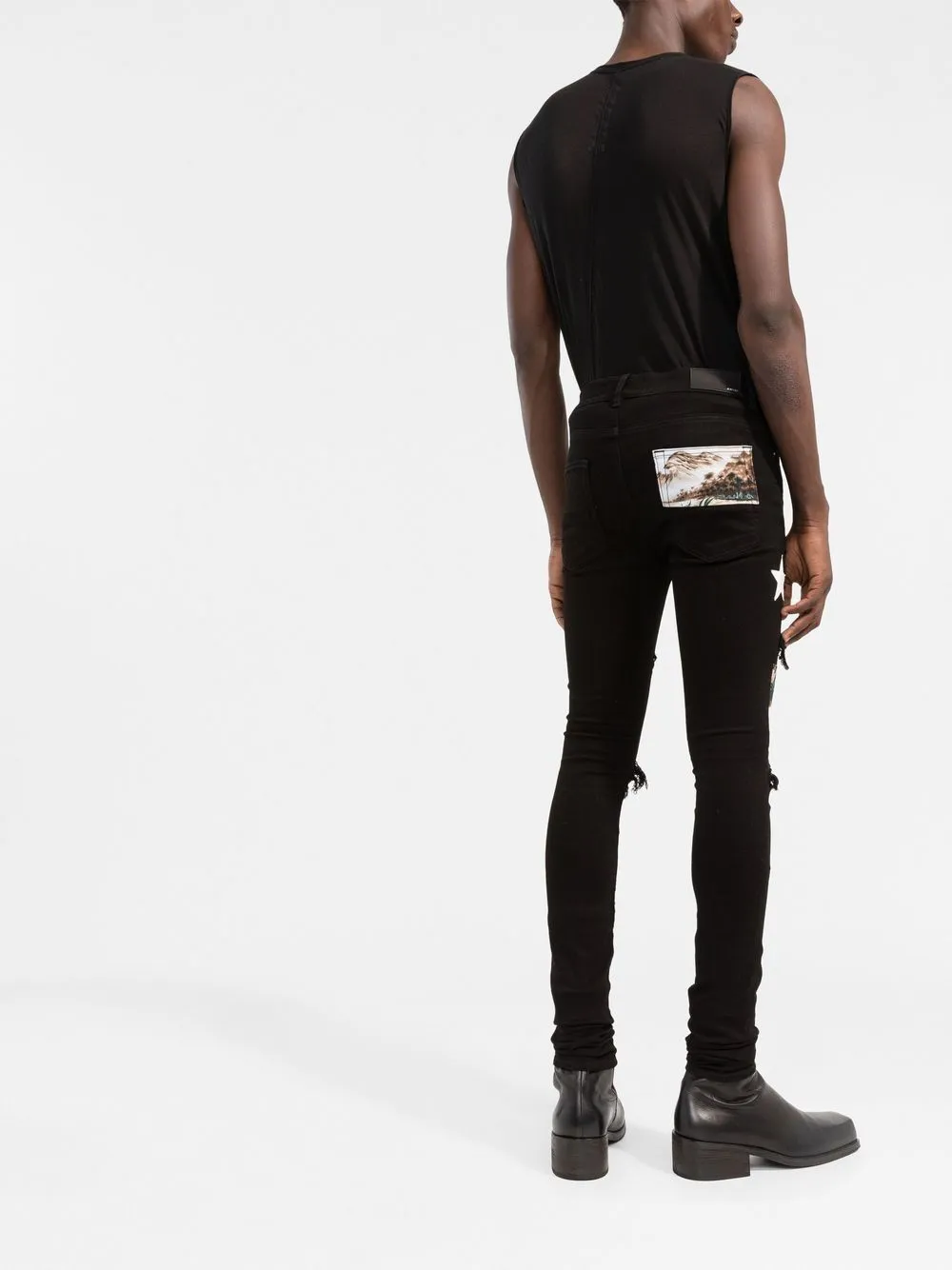 AMIRI patchwork distressed skinny jeans